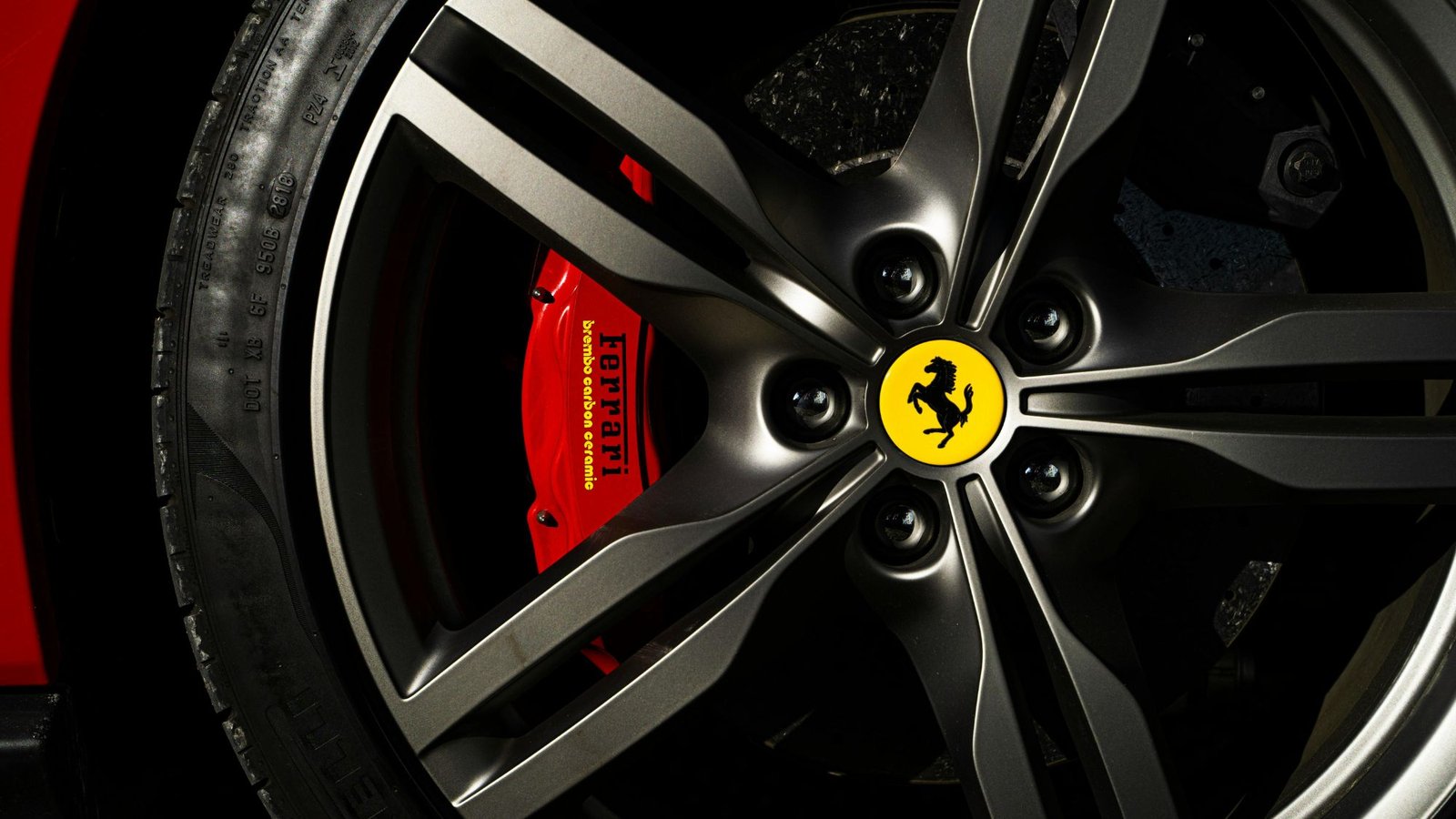 A ferrari's close-up wheel shot showcasing that custom mods can increase the vehicle resale value