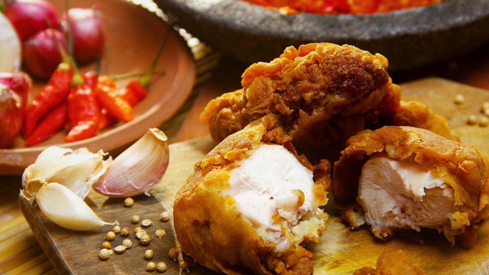 A plate of delicious crispy fried chicken and assorted food items, including my favorite meat, placed on a table